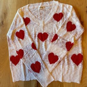 New heart sweater very cute without tags have different sizes